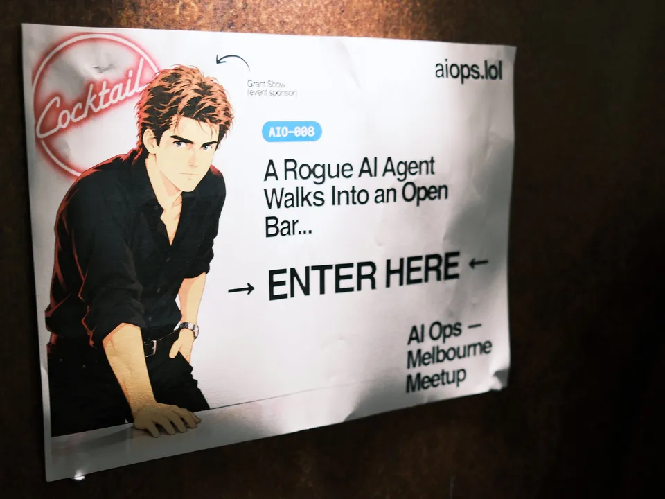 The AI Ops 008 event poster welcoming guests at the entrance