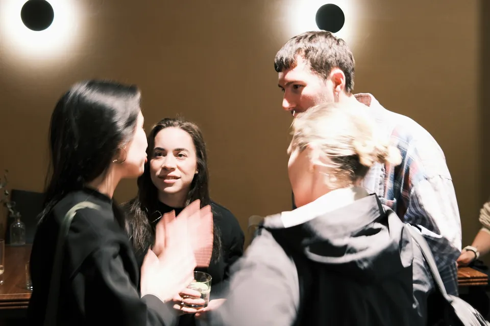 Guests chatting together at AI Ops 008